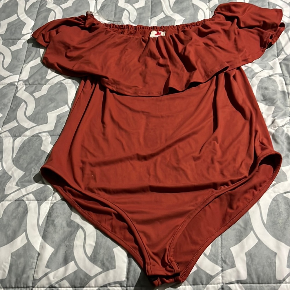 Woman’s. Brand new bodysuit blouse with tags size 2xl price 14.00